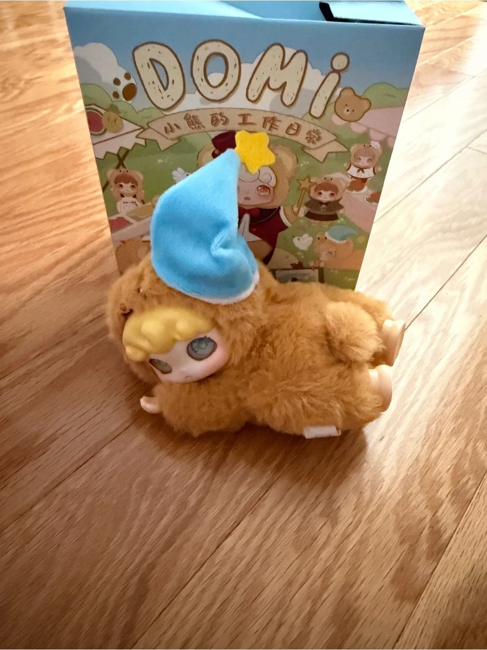 Plush Small Pet Toy in Tan Fur with Blue Hat